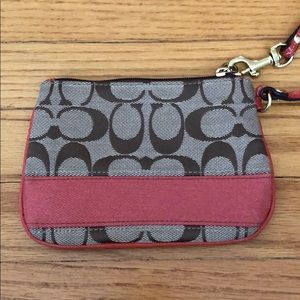 Coach wristlet with coral stripe!